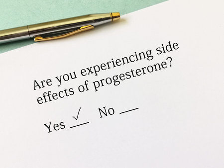 One person is answering question about side effects. She is experiencing side effects of...