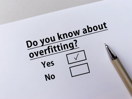 A person is answering question about artificial intelligence. He knows about overfitting.の写真素材