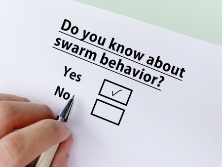 A person is answering question about artificial intelligence. He knows about swarm behavior.の写真素材