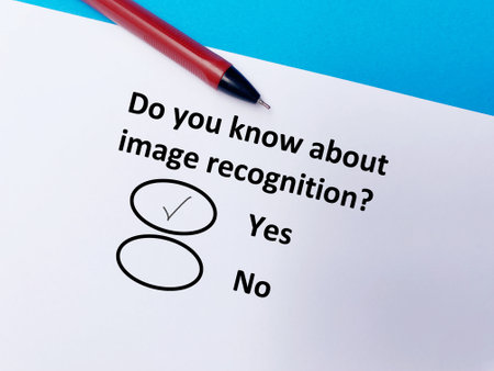 A person is answering question about artificial intelligence. He knows about image recognition.の写真素材