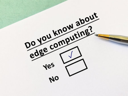 A person is answering question about artificial intelligence. He knows about edge computing.の写真素材