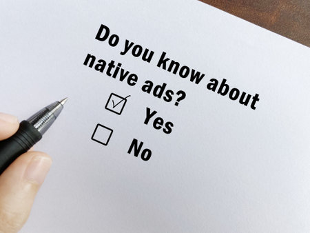 A person is answering question about advertisement. He knows about native ads.の写真素材