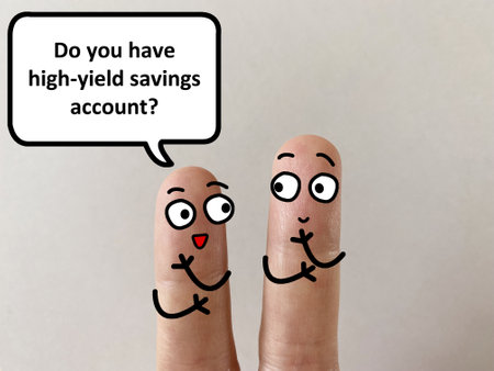 Two fingers are decorated as two person. One of them is asking another if he has high yield savings account.の写真素材
