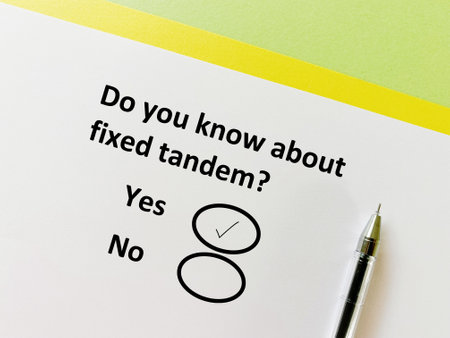 A person is answering question about logistics. He knows about fixed tandem.の写真素材