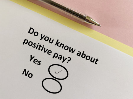 A person is answering question about logistics. He knows about positive pay.の写真素材