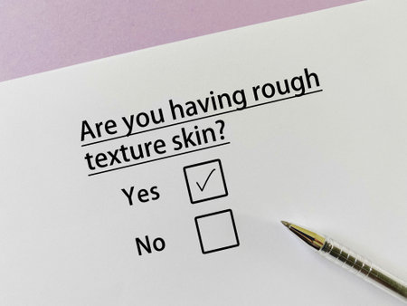 A person is answering question about skin problem. He is having rough texture skin.の写真素材