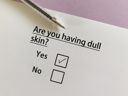 A person is answering question about skin problem. He is having dull skin.の写真素材