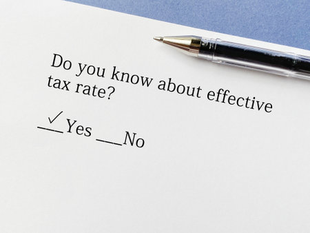 A person is answering question about taxation. He knows about effective tax rate.の写真素材