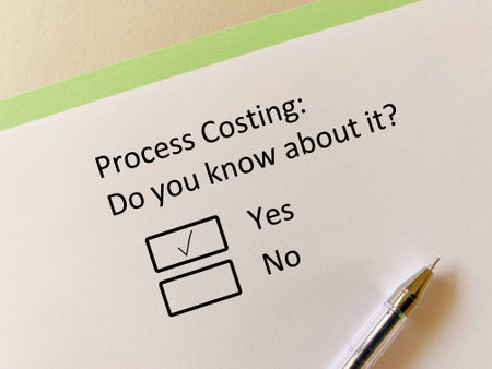 A person is answering question about finance. He knows about process costing.の写真素材