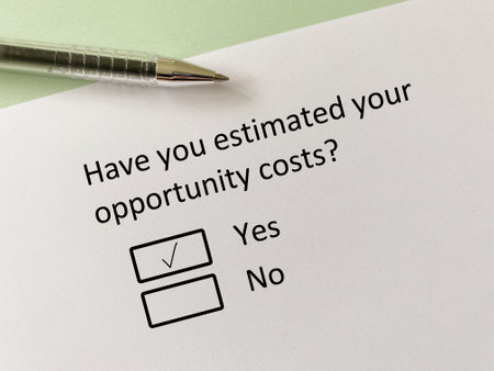 A person is answering question about finance. He has estimated his opportunity costs.の写真素材