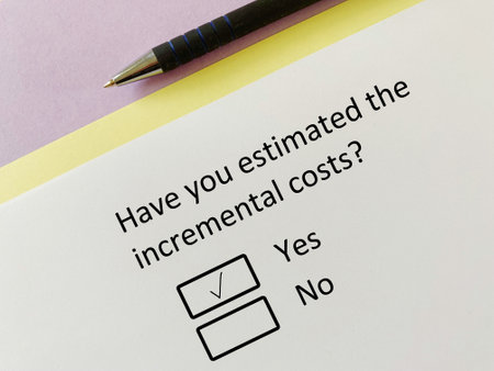 A person is answering question about finance. He has estimated the social costsの写真素材