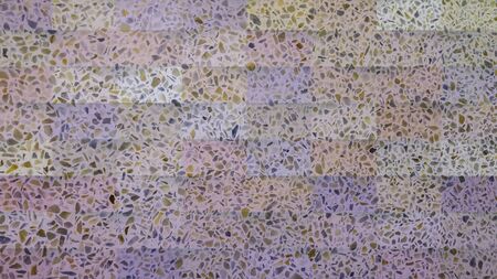 Beautiful multi colored stone wall background, close upの写真素材