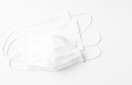 White mask and coronavirus protection isolated on a whiteの写真素材