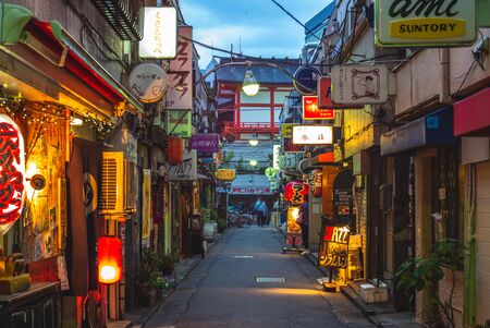 Tokyo, Japan - June 11, 2019: night scene of Shinjuku Golden Gai, There are over 200 tiny shanty-style bars, clubs and eateries, and famous for the nightlife.のeditorial素材