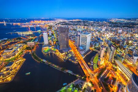 aerial view of yokohama port in japan at nightの写真素材