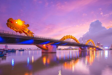 Dragon Bridge in Da Nang, vietnam at nightの写真素材