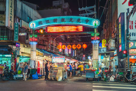 Taipei, Taiwan - September 11, 2015: night view of the entrance of Linjiang Street Night Market, one of the most popular night market in taipeiのeditorial素材