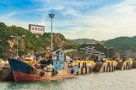 Fuao Harbor at Nangan island, Matsu, Taiwan. translation of the Chinese text is make a spear as...