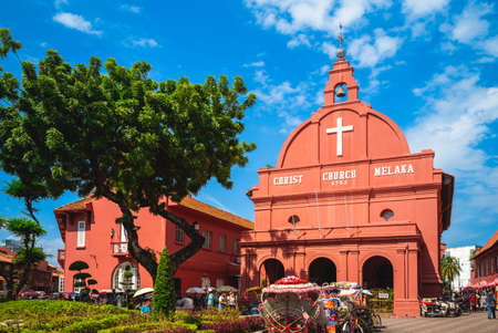 August 12, 2018: Stadthuys and Melaka Red Clock Tower, aka Tang Beng Swee Clock Tower, located at Dutch Square in, Melaka, Malacca, Malaysia. Stadthuys was built in 1650 and clock tower was in 1886.のeditorial素材