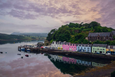 scenery of Portree harbor in scotland, uk at duskの写真素材