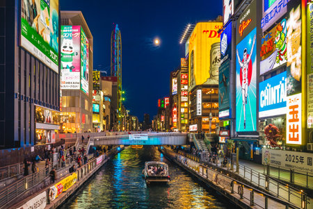 November 21, 2018: dotonbori, or Dotombori, is a principal tourist destination running along the Dotonbori canal from Dotonboribashi Bridge to Nipponbashi Bridge in the Namba district of Osaka, Japan.のeditorial素材