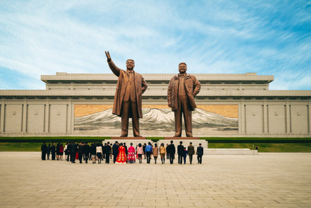 April 29, 2019: 20 meter tall Kim Il Sung and Kim Jong Il statues at the central part of the Mansu Hill Grand Monument located at Mansudae, pyongyang. It was originally dedicated in April 1972のeditorial素材