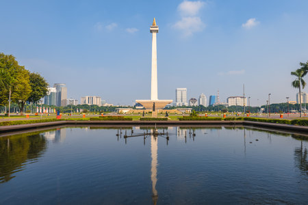 July 12, 2023: National Monument standing in the middle of the Merdeka Square, a large square located in the center of Jakarta, Indonesiaのeditorial素材