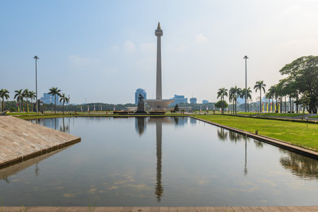 July 12, 2023: National Monument standing in the middle of the Merdeka Square, a large square located in the center of Jakarta, Indonesiaのeditorial素材