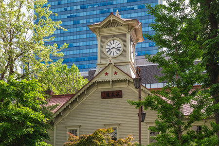 Sapporo clock tower, former Agricultural College, in Sapporo, Hokkaido, Japan. Translation: Martial Arts Hallのeditorial素材
