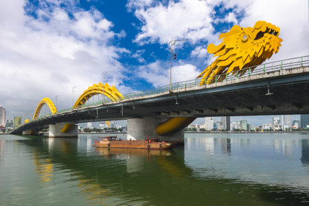 Dragon Bridge, the landmark of Da Nang crossing han river in vietnamの写真素材
