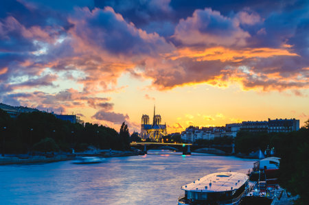 Night scene of Notre Dame de Paris Cathedral and Seine River in Paris, Franceの写真素材