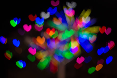 Defocused lights background. Heart bokehの写真素材