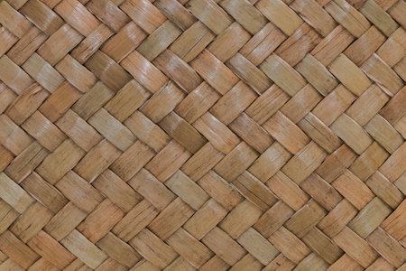 traditional thai style pattern nature background of brown handicraft weave texture bamboo surface for furniture materiaの写真素材