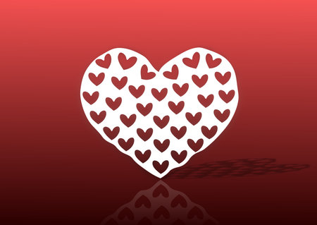 A heart shaped paper cutout on a red background 