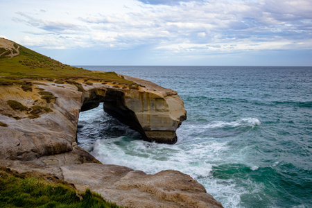 Tunnel Beach, outside of Dunedin, on a choppy day. Shot in October.