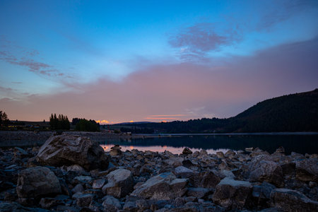 Lake Tekapo in the glow of the spring sunriseの写真素材