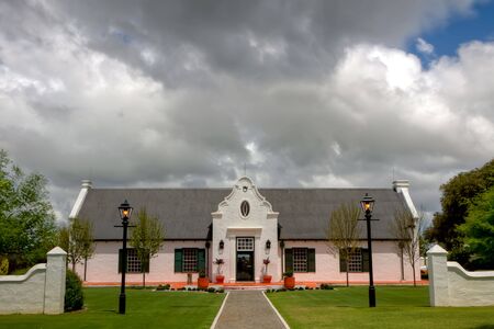 View of an old winery building and formal gardens, Margaret River, Australiaの写真素材