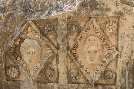 Mask photo from the Greek-Roman amphitheater. Masks and Lycian tombs in the Myra, Turkeyの写真素材
