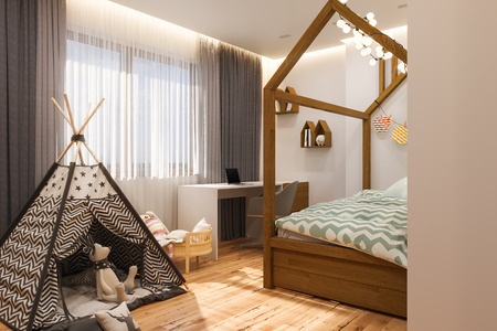 Childrens playroom and bedroom in the Scandinavian style. The interior design is in traditional light colors with accents of natural wood. An architectural concept for a news blog.の写真素材