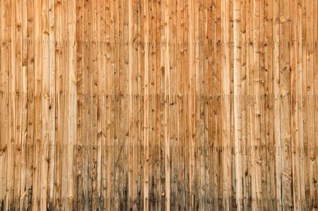 Old vertical wood planks with screws texture の写真素材