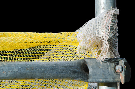 Detail of two steel scaffold pipes isolated on yellow sow background.の写真素材