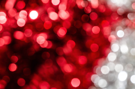 Abstract red and silver circle christmas lights as background.