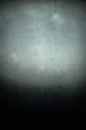 Grey stucco plaster background, gradation light vintage.の写真素材