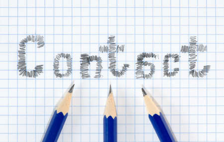 Business concept, contact word on square paper and three blue pencils. の写真素材