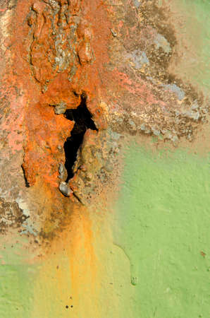 Detail of green yellow rusty metal surface.の写真素材