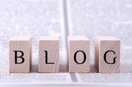 Four wooden blocks with word blog written on.の写真素材