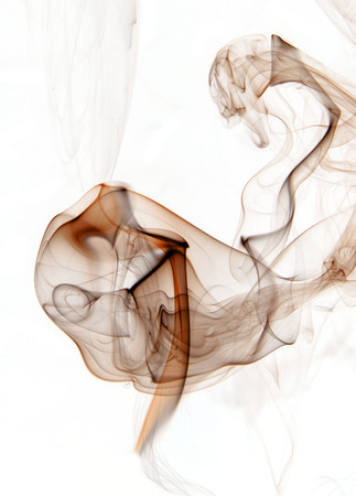 Brown insence smoke on white background, graphic resource.の写真素材