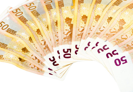 Stack of fifty euro bills isolated on white background. european currency economic concept.の写真素材