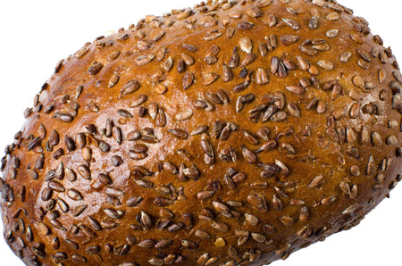 Loaf of wholemeal bred isolated on white background as a healthy eating concept.の写真素材