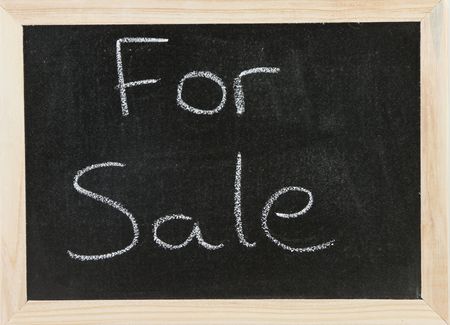 Black chalk board with wooden framed surround with the words For Sale.の写真素材